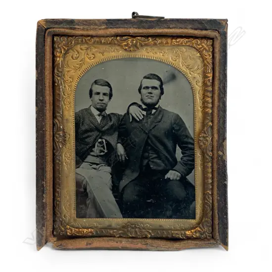 Leather gilt framed and matted ambrotype - two seated men,
